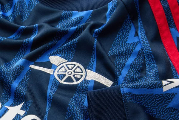 Camiseta de visitante del Arsenal para niños (camiseta y pantalón corto) 2025/26